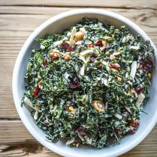 Black kale salad with toasted hazelnuts, aged cheddar and cranberries
