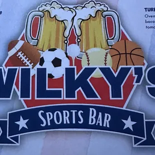 two mugs of beer and a football