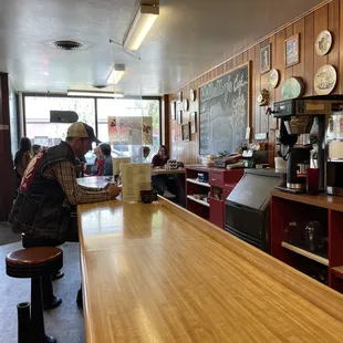 a man sitting at the bar
