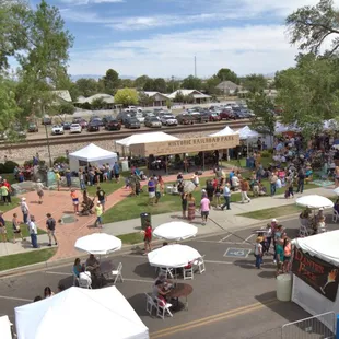 a crowd of people at a wine festival