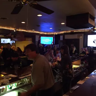 Large old school bar area with my dad singing an old school German drinking song much to the dismay of the bar patrons.
