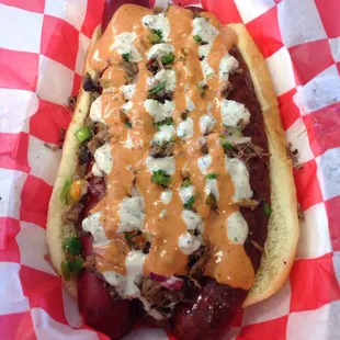The Boss Hogg it's a Four meat chop beef pulled pork  hot link and sausage with our homemade barbecue sauces and relish