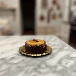 This is the single serving pecan caramel tart. It is about 2" tall and 3 1/2" across.