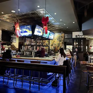 people sitting at the bar