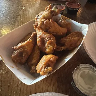 Bone in wings with buffalo sauce