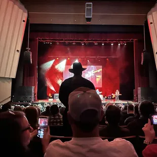 Then this guy decided to stand up for the entire song (