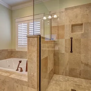 a walk - in shower and tub