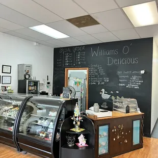 a bakery with a chalkboard wall