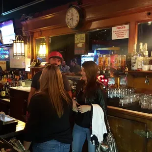 a group of people at the bar