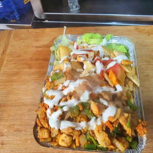 Chicken over rice with pita  bread