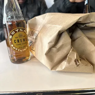 Cream Soda, unopened bag of Pepperoni Knot (1) and Pepperoni Slice.