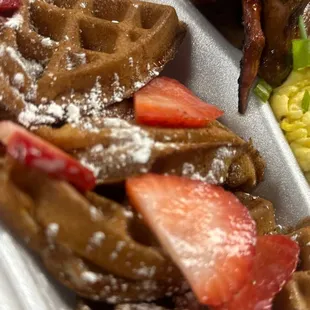 Smoked chicken wings with a Belgium waffle and some eggs.