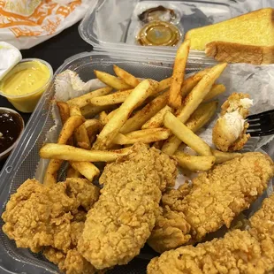 chicken tenders and fries.