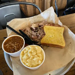 Pulled pork. Garlic toast. Mac n cheese. Beans.