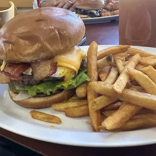 Cheeseburger with egg and fries. 11/17/22