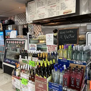 Inside the Alameda Liquor store. Deli and Grill to the right.