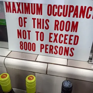  a sign stating maximum occupancy of this room not to exceed 800 persons