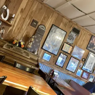 a dining area with tables and chairs