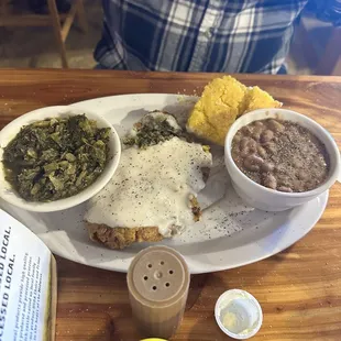 Chicken fried steak with turnip greens and pinto beans