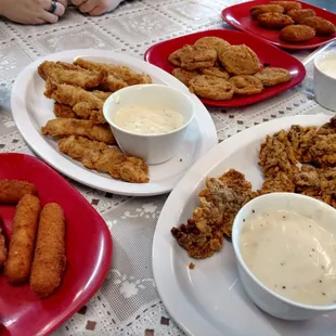Appetizers of Mozzarella sticks, spokes, and fried green tomatoes