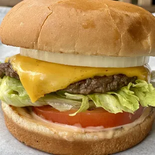 Very popular Hammer 2, one patty, one cheese, thick tomato, lettuce, sauce.