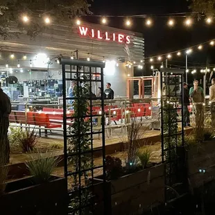 A mini bocce ball court and a garden fireplace add to fun at Willie's. More games coming soon.