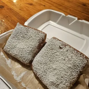 Beignets so soft and fresh my nail left a mark.