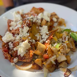 Chilaquiles (don&apos;t call them Mexican nachos unless you want to be a dork like me and get laughed at lol)