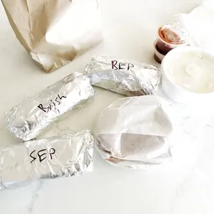 Sausage Egg Potato, Brisket taco, Bacon Egg Potato, Sliced brisket sandwich.