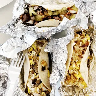 Brisket with pickles and onions (top), Sausage egg potato (left), Bacon egg potato (right).