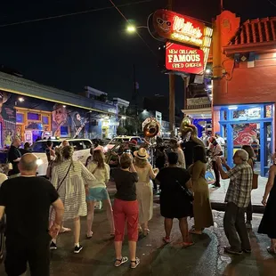 a crowded street at night