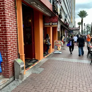 people walking down the sidewalk