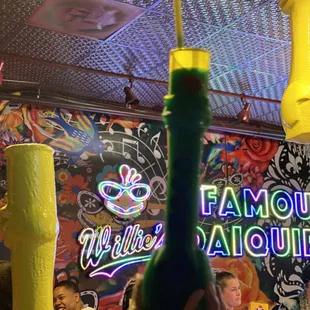 a neon sign in the background