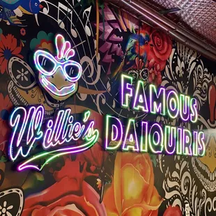 a neon sign for willie&apos;s daughter