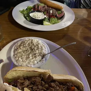 Steak salad in the top of the photo.