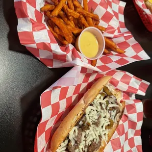 Steak bomb sandwich and sweet potato fries
