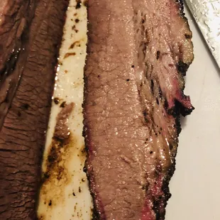 a piece of meat on a cutting board