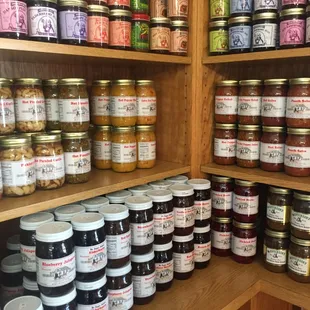a shelf full of jams
