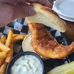 a fish sandwich and fries