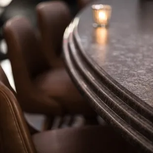 Our plush barstools are comfortable enough to enjoy a few drinks at our bar. We also have purse hooks under our bar.