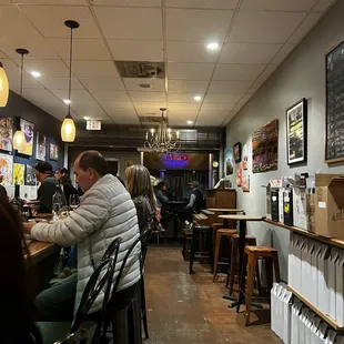 people sitting at the bar