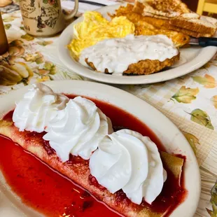 a slice of strawberry pie with whipped cream