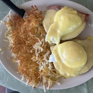 My husband&apos;s eggs Benedict and hashbrowns