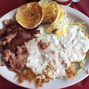 Corned beef hash and eggs, hash browns with country gravy and an English muffin.