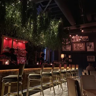 the interior of a dimly lit restaurant