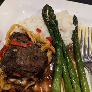 Pretty rough filet that was cooked wrong, risotto that I honestly couldn&apos;t differentiate from mashed potatoes with how mushy it was.