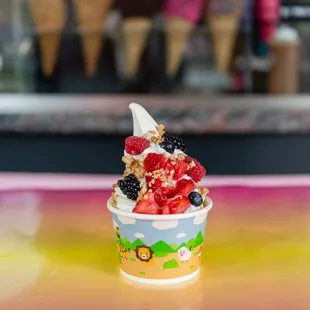 a yogurt topped with berries