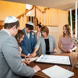 Signing the Licence.