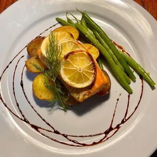 a plate of food on a wooden table