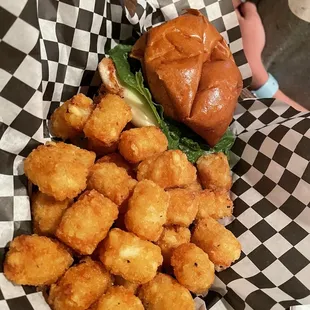 Grilled chicken sandwich and tater tots